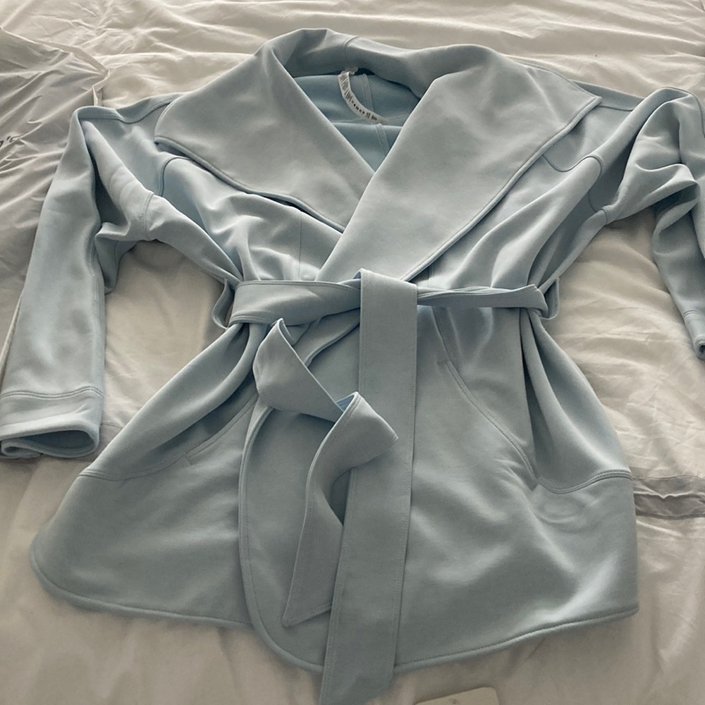 Brand New Lululemon Softstreme Belted Wrap. Tags still attached. Size M/L